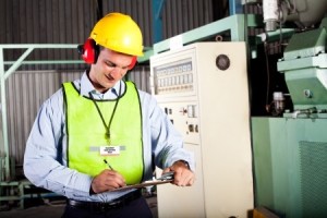 worker writing on paper